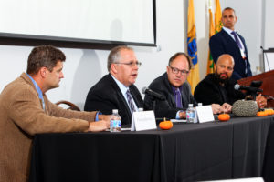 Savita Lachman and Rebecca Savelli sitting on a panel discussion