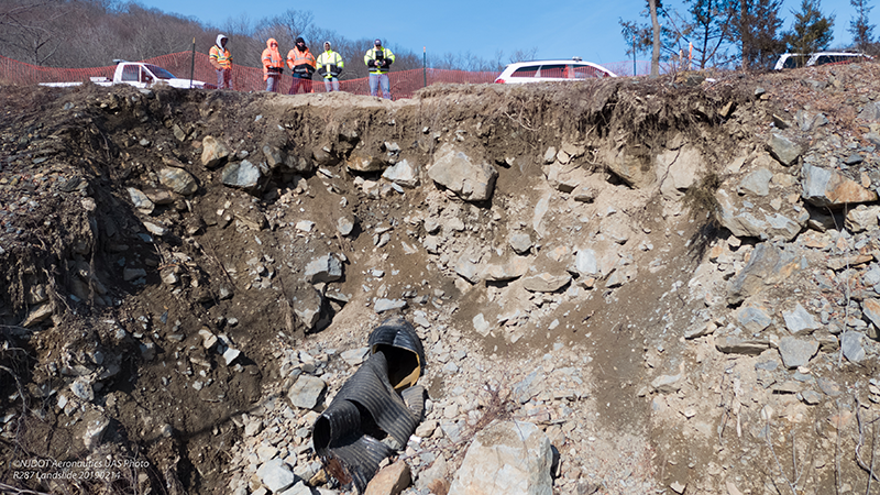 UAS Team in the field exploring the damage from rockfall along I-287