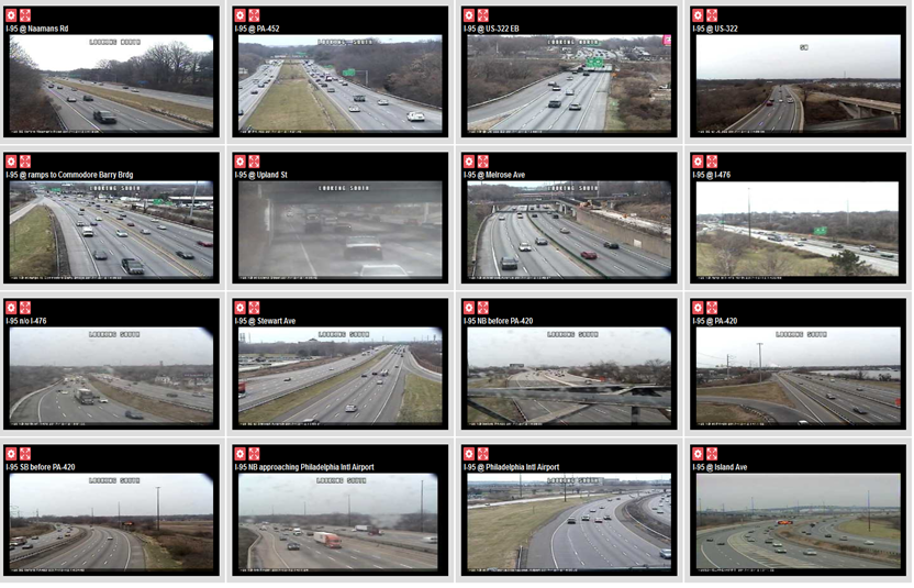 Image of 16 video feeds, each of a different stretch of highway, a video wall for traffic operations monitoring.