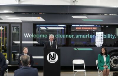 NJ Transit CEO Kevin Corbett unveiling the first NJ Transit bus garage with electric charging capability. 