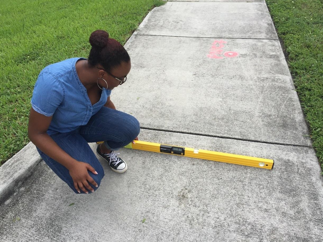 Teams collecting data for SAPFIM still physically measure sites before inputting the information digitally. This physical component could help experientially familiarize participating stakeholders with the wider built environment of their communities. Courtesy of Broward Metropolitan Planning Organization.